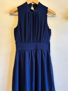Sleeveless Navy Chiffon Midi Dress with High Neck and Pleated Waist